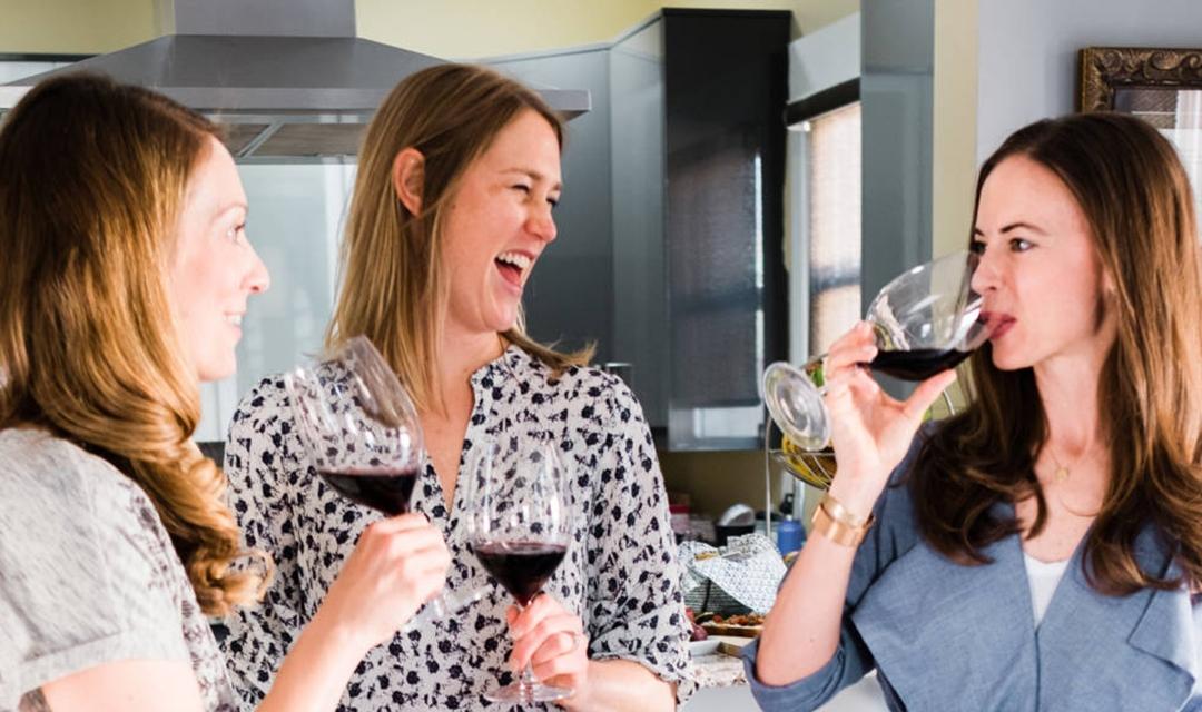 women wine tasting
