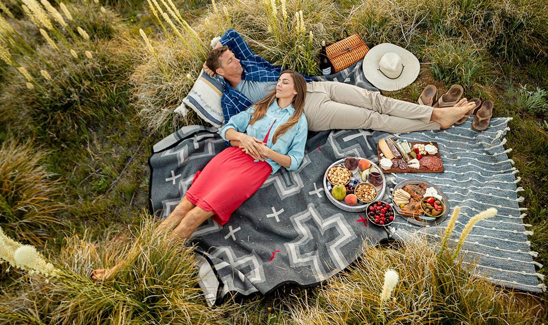couple napping picnic blanket