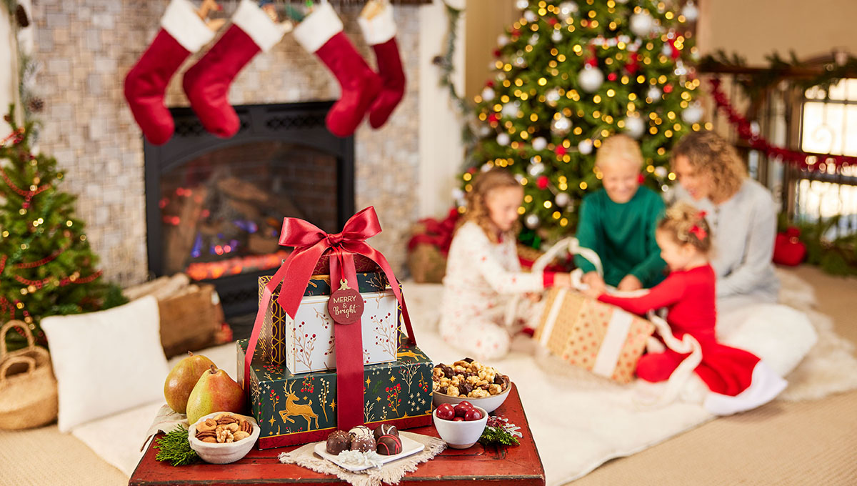 Family opening Christmas gifts on Christmas morning.