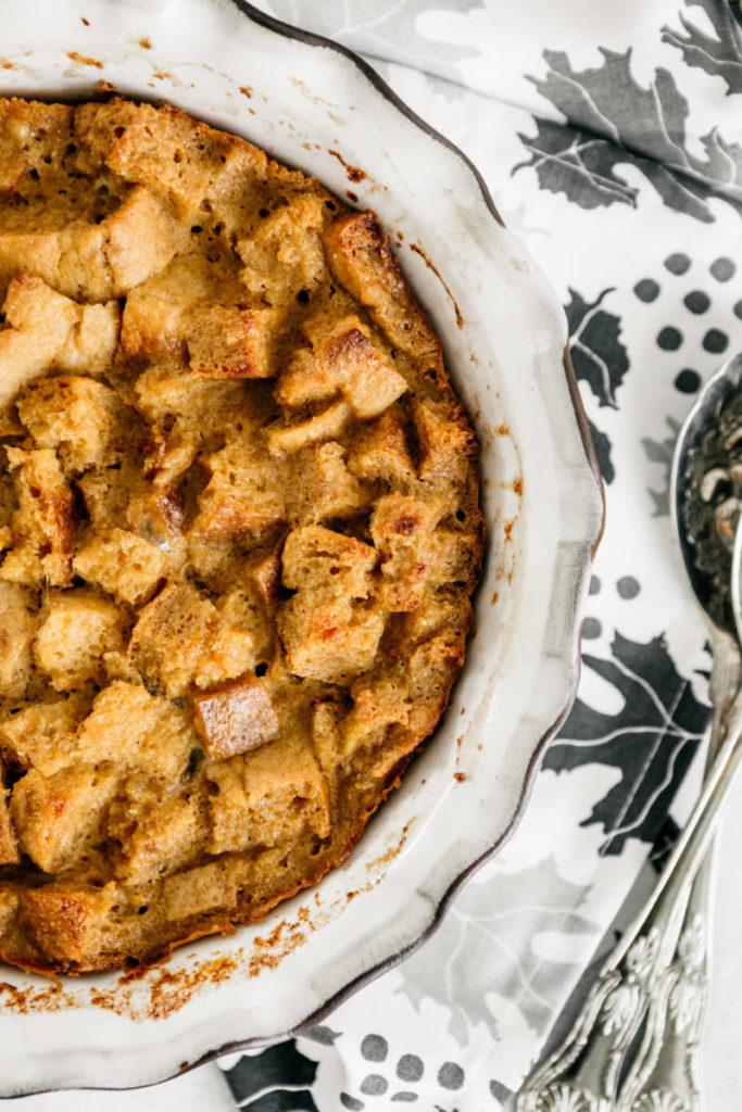 Bread pudding recipe with a closeup of a dish of bread pudding.