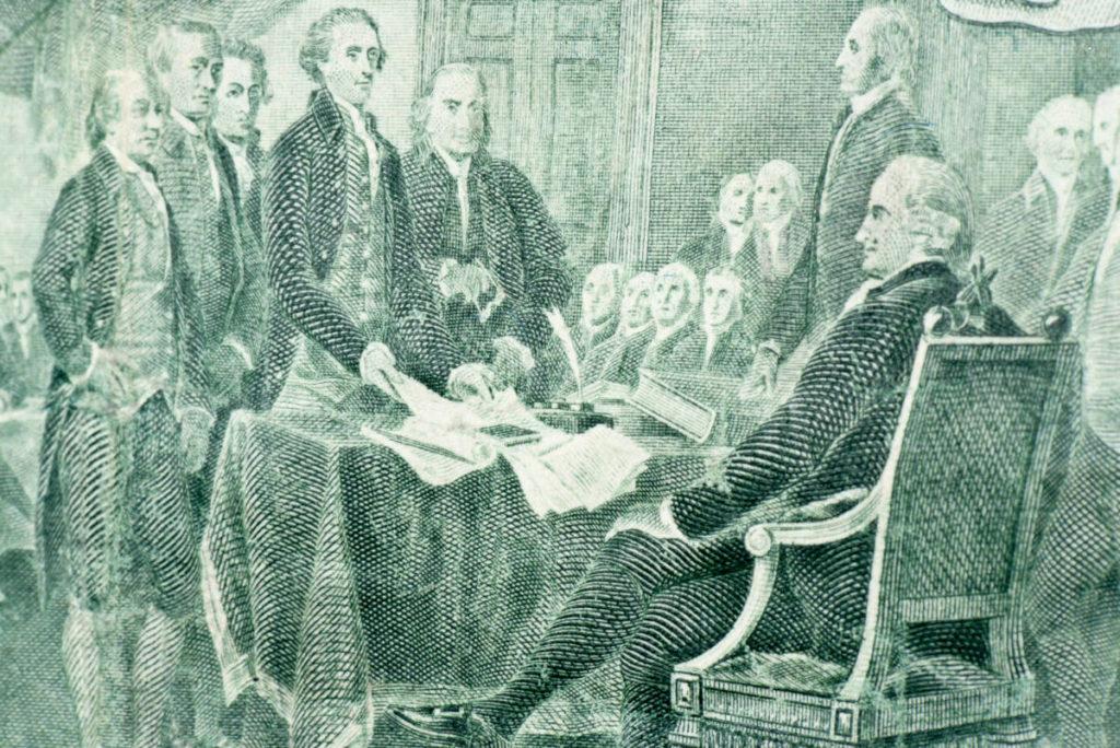 Fourth of July facts with a painting of founding fathers signing the Declaration of Independence.