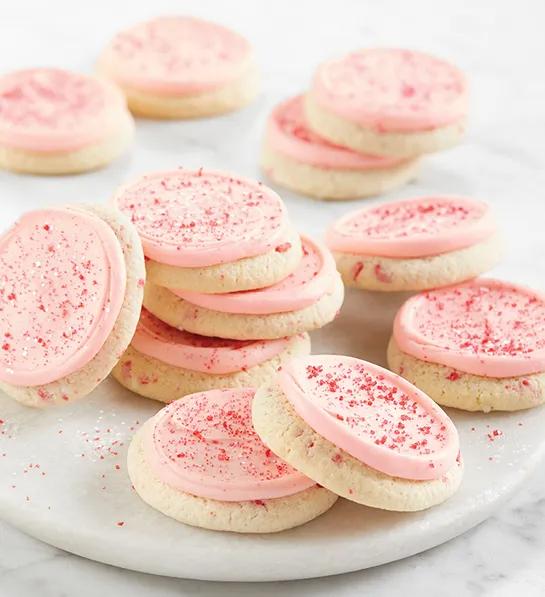 Gifts under $ with a stack of pink frosted cookies.