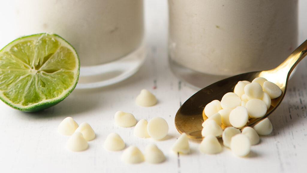 Flavor pairings with white chocolate and lime on a counter.