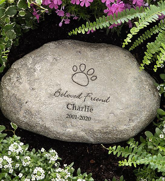 Feel better gifts with a carved stone in a garden.