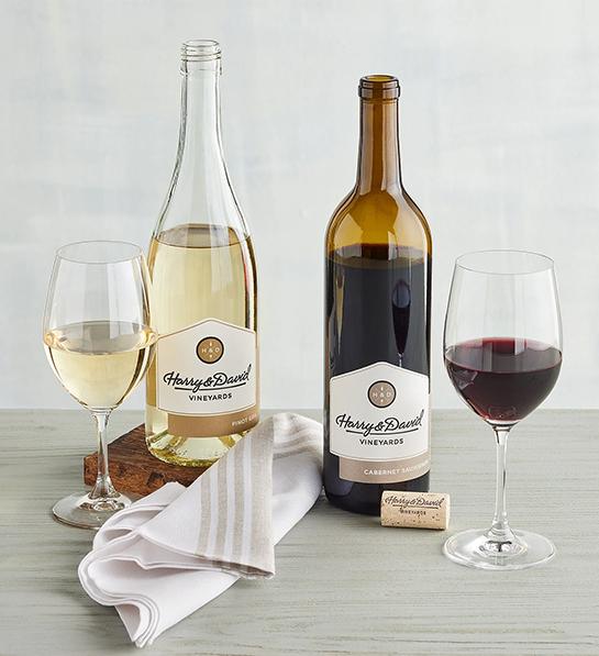 Feel better gifts with two bottles of wine and two full glasses.