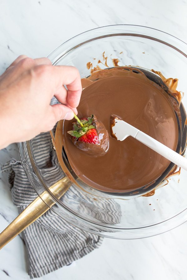 making the chocolate covered strawberries