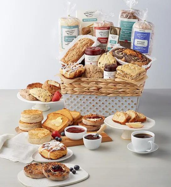 Best gift basket full of English muffins and other breakfast items surrounded by similar items on plates and platters