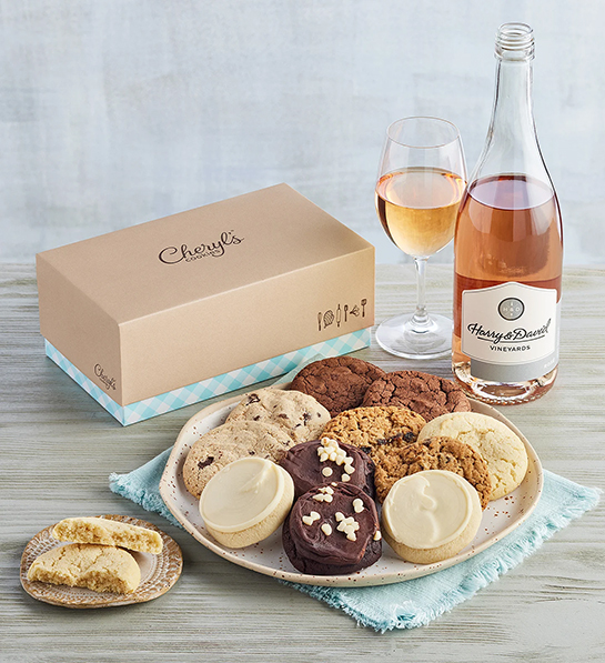 Mothers Day gift ideas with a plate of cookies next to a bottle and glass of ros wine