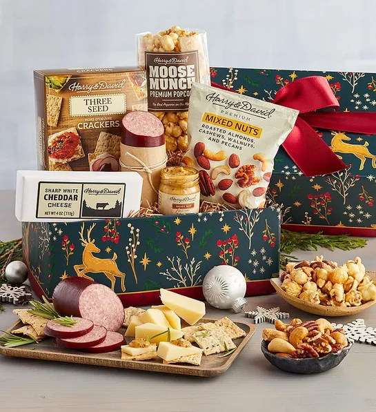 Gifts under  with a box full of savory snacks like cheese meat and crackers