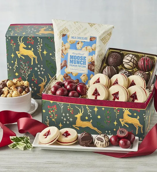 Gifts under  for Christmas with a box full of truffles cookies chocolate and Moose Munch