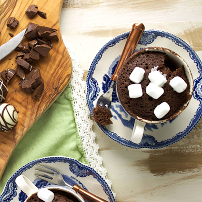 Chocolate truffle mug cake topped with marshmallows