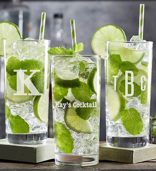 A photo of gifts for men with three personalized glasses monogrammed with initials and full of ice liquid lime and mint