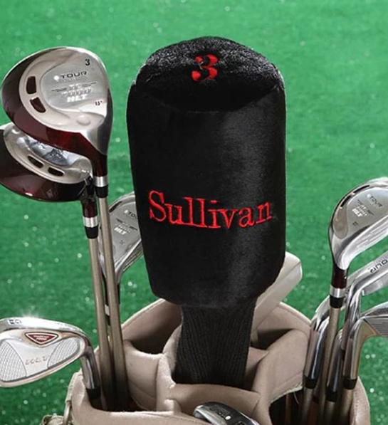 A photo of gifts for men with a customized golf club cover with the name Sullivan printed on it