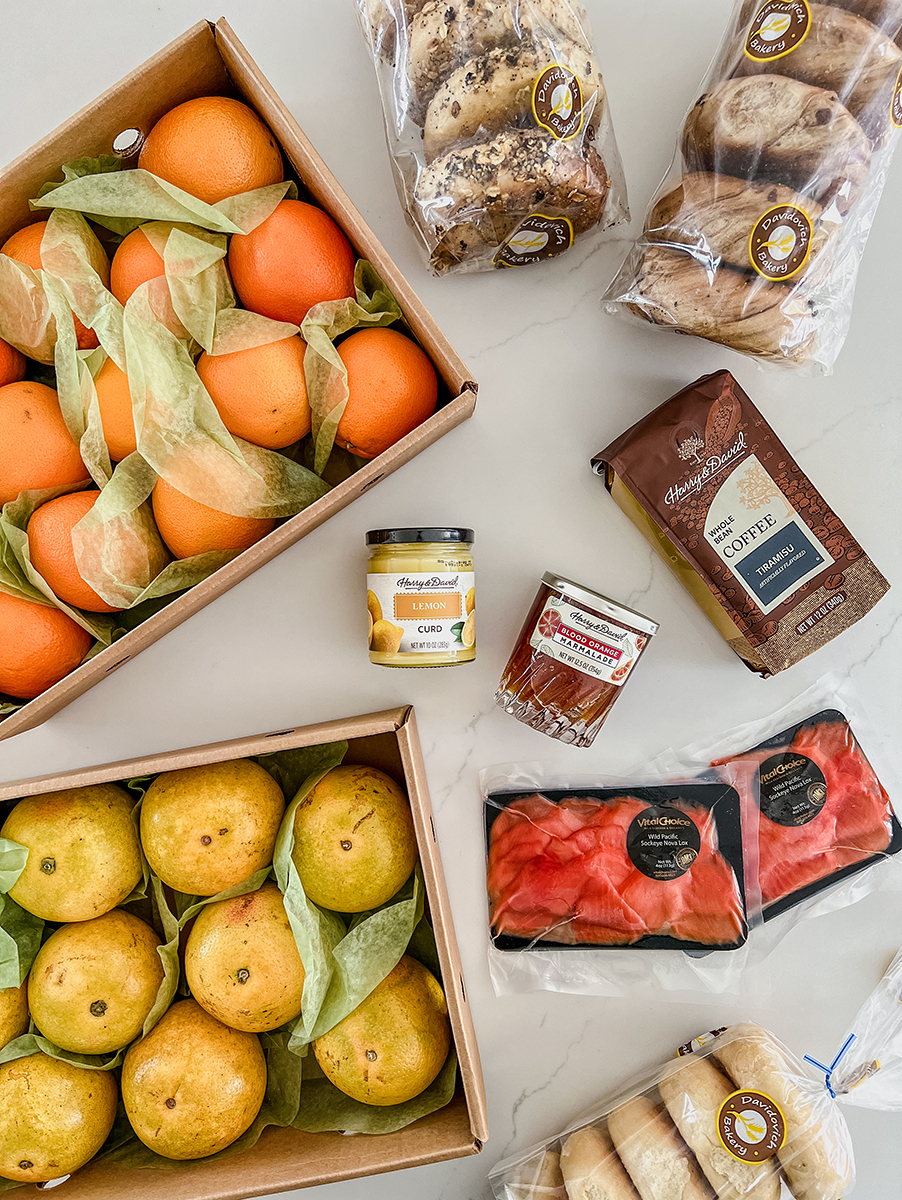 A photo of a bagel board with the ingredients arrayed on a counter.