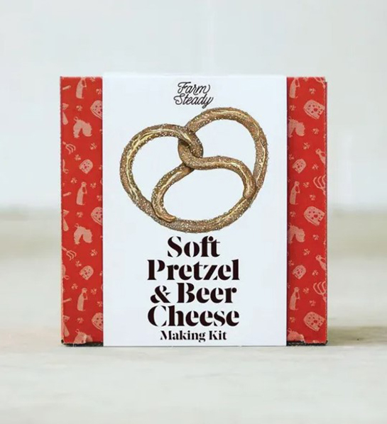 A photo of graduation gift ideas with a soft pretzel  beer cheese making kit