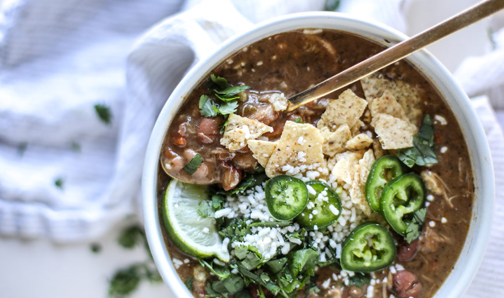 Food puns with a bowl of chicken chili topped with jalapenos