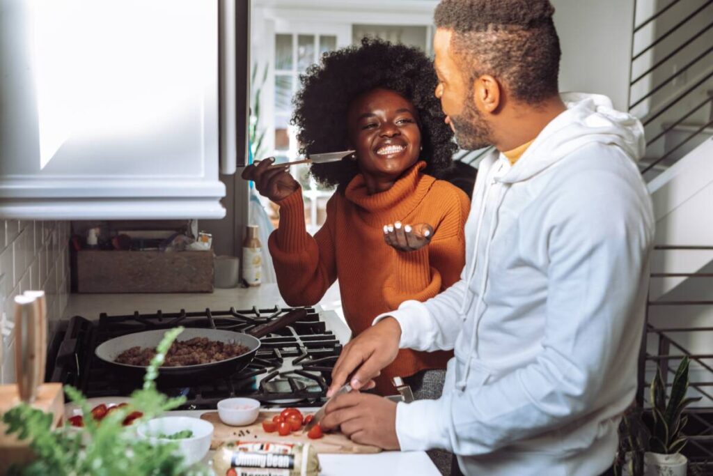 Cooking therapy with two people cooking in a kitchen.