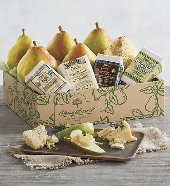 Pear harvest with a box of pears and cheese