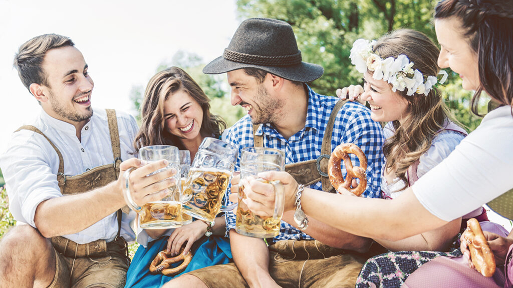 Fall birthday party with a group of friends celebrating Oktoberfest