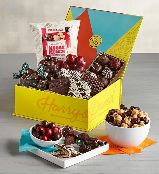 Best gifts with a box of chocolates surrounded by more chocolate in bowls