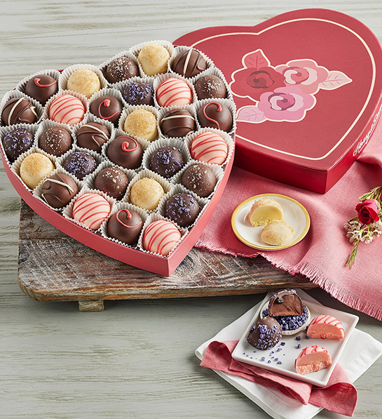 Valentines Day gifts for her with a heart shaped box full of truffles