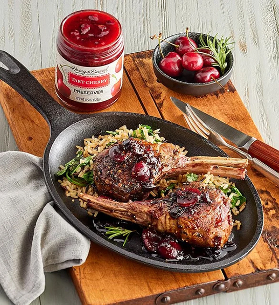 Lamb with cherry glaze in a cast iron skillet