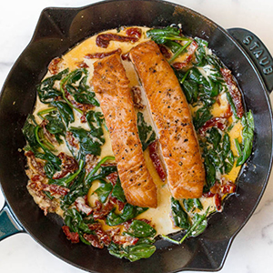 Cast iron salmon recipe with spinach cream sauce