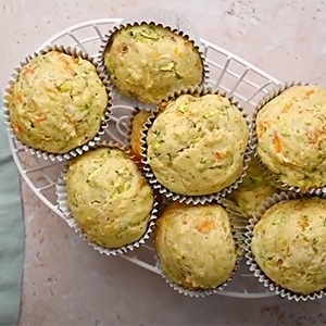 Carrot zucchini muffins in a tin basket