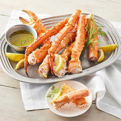 Plate of Alaskan crab legs with butter