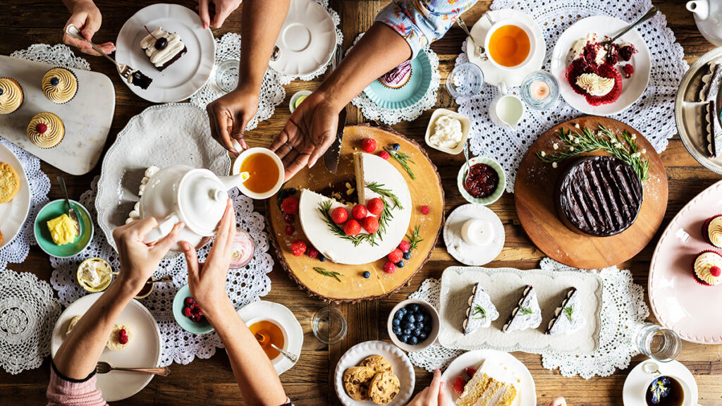 Friends Gathering Together on Tea Party Eating Cakes Enjoyment h