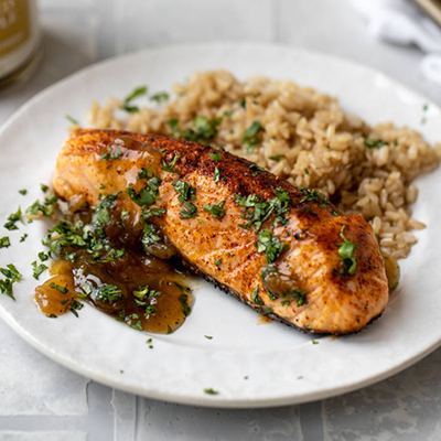 Pineapple recipes with a plate of grilled salmon and rice