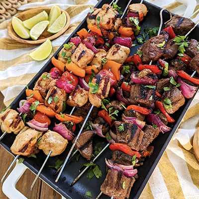 Pineapple recipes with a platter of kebabs on a table