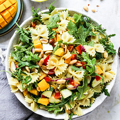 Mango recipes with a bowl of mango pasta salad