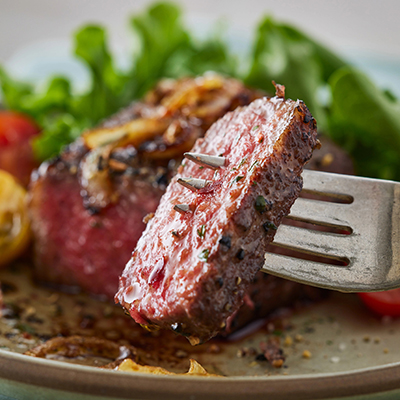 Mango recipes with a slice of steak on the fork